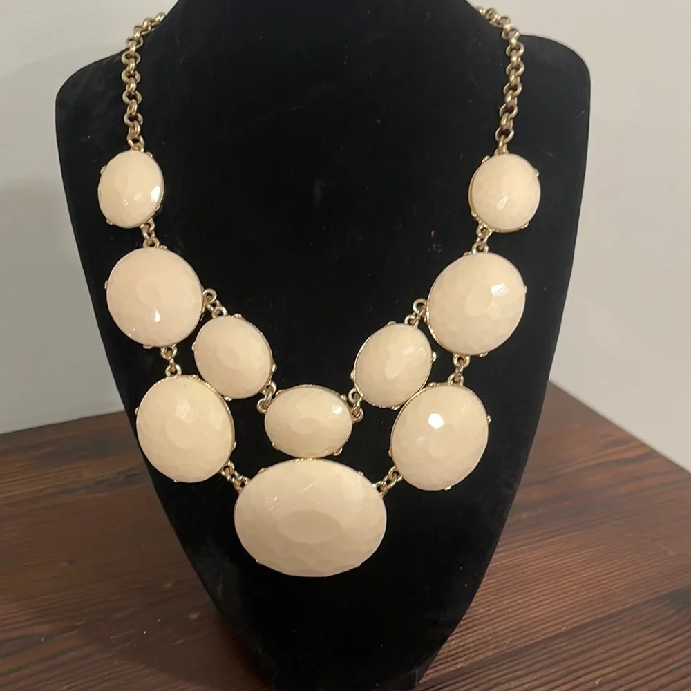 Ivory and gold tone statement necklace.